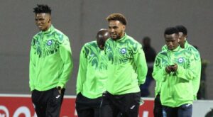 Richards Bay FC players doing a pitch inspection