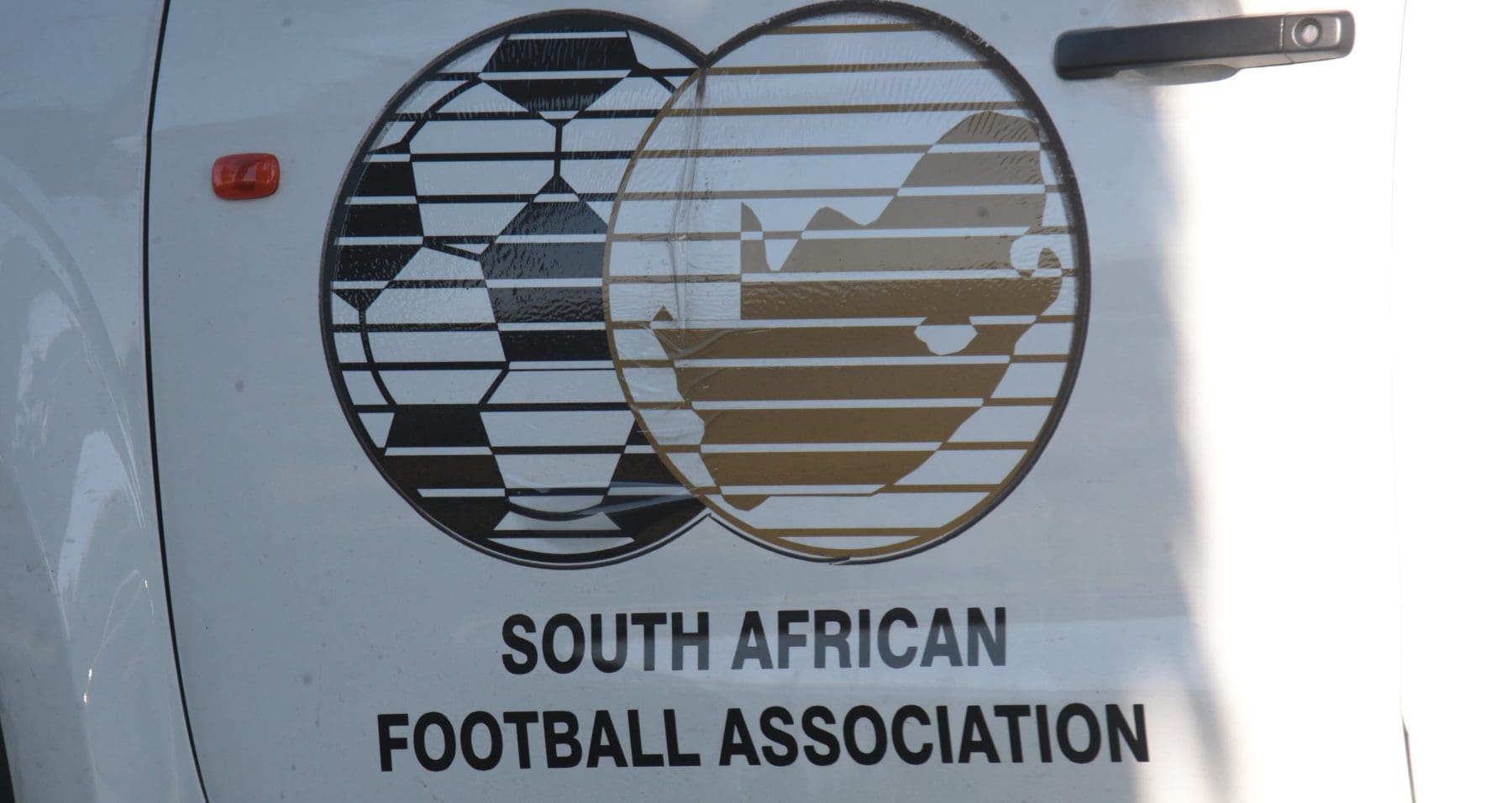 The SAFA, where is there chaos. This is a Logo on the front door of a vehicle during the ABC Motsepe League National playoffs