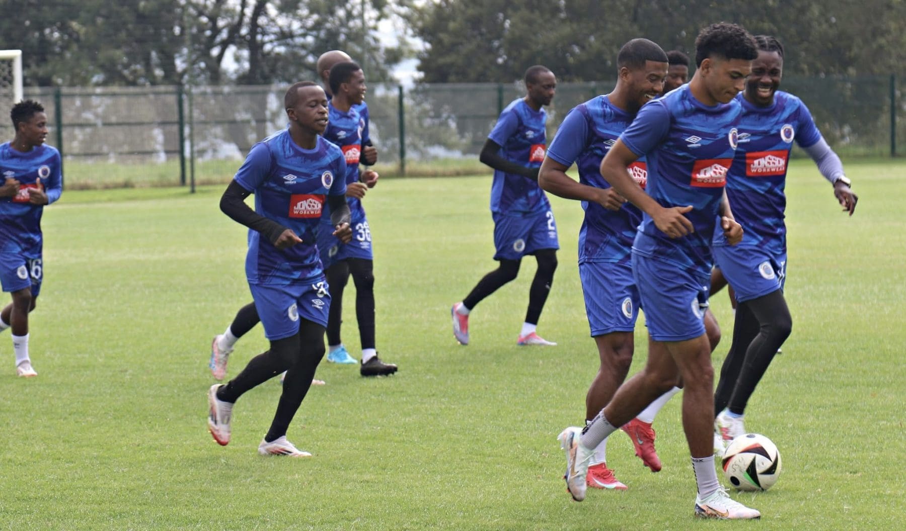 SuperSport United players running during training session 