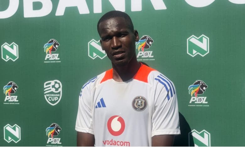 Orlando Pirates defender Tapelo Xoki speaking with the media
