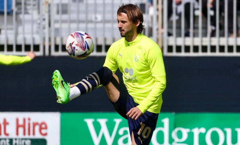UK-based midfielder Ethan Chislett playing with the ball