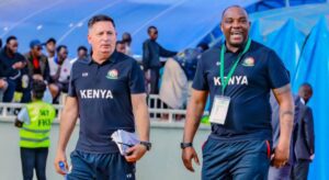 Vasili Manousakis and Benni McCarthy wearing Kenya national team attire