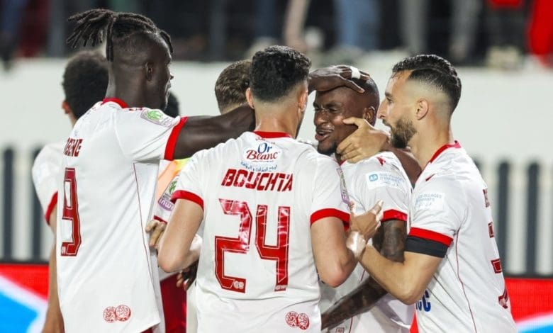 Wydad AC players celebrating Thembinkosi Lorch's goal against AS FAR