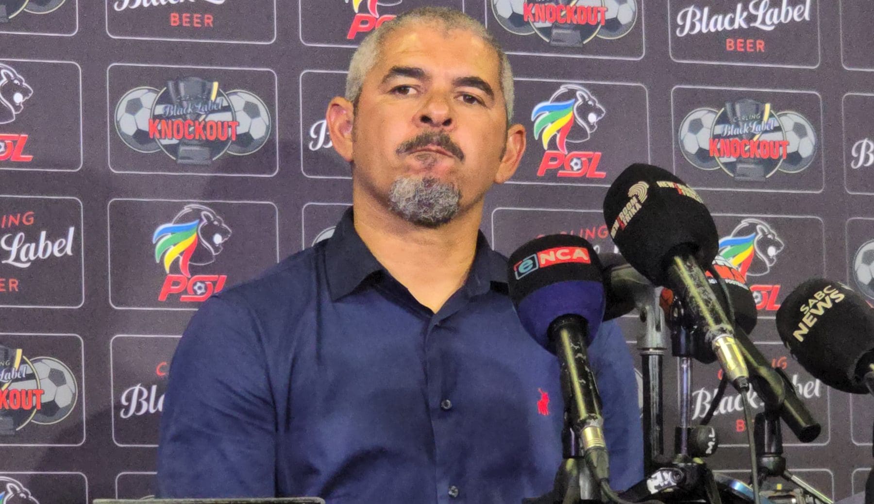 Clinton Larsen addressing the media after the Carling Knockout Final victory 