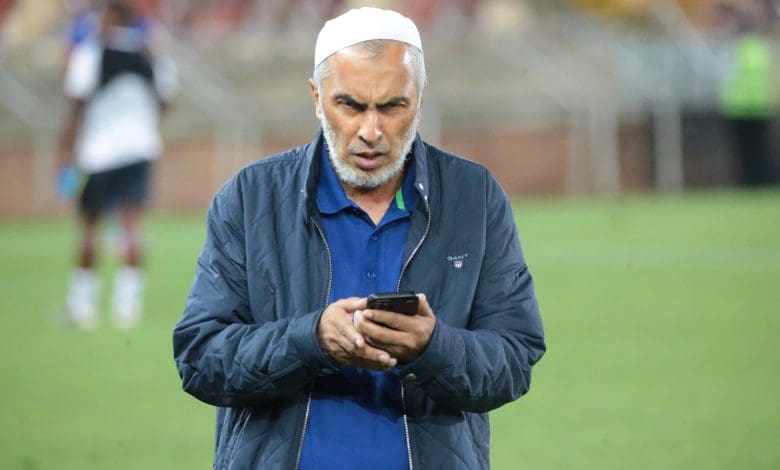 Durban City chairman Farouk Kadodia on his phone at Peter Mokaba Stadium.
