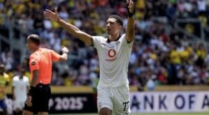 Borussia Dortmund star Jobe Bellingham celebrating after scoring a goal