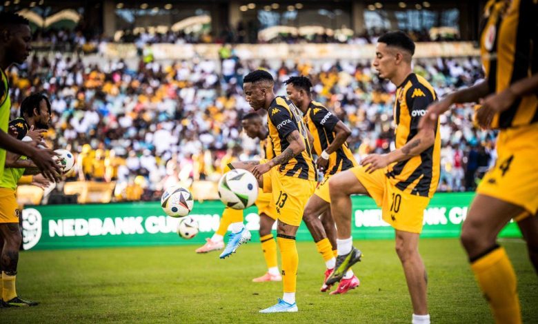 Kaizer Chiefs players warm up before a game