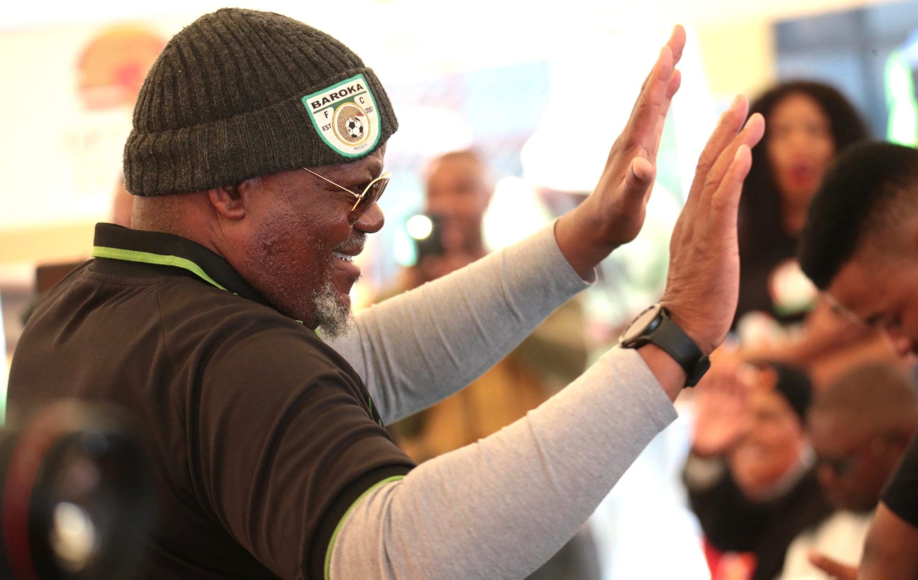 Baroka FC Chairman Khurishi Mphahlele waving at the supporters 