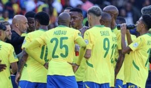 Mamelodi Sundowns players listening to Miguel Cardoso