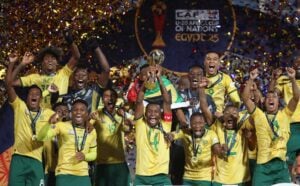 SA U-20 players lifting the trophy after AFCON triumph in Egypt