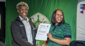 AmaZulu FC CEO Sinenjabulo Zungu and DUT Management after signing a partnership