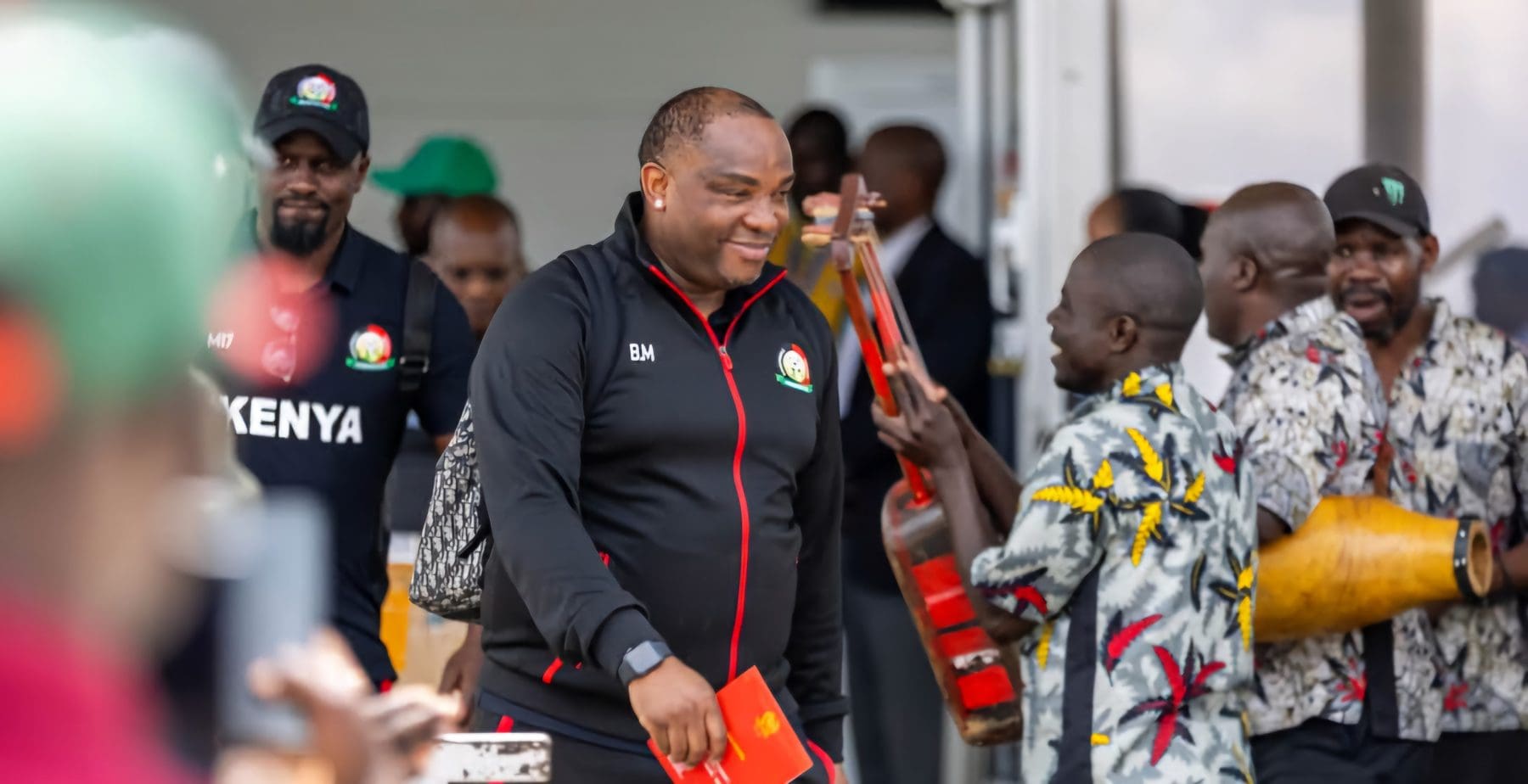 Benni McCarthy arriving at the airport with the Harambee Stars team 
