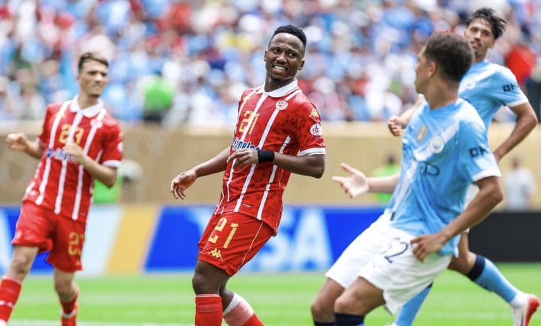 Former Wydad Casablanca attacker Cassius Mailula in a match against Manchester City
