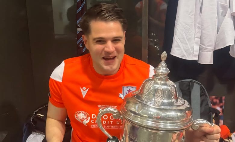 Jethren Barr holding a Sports Direct FAI Cup