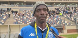 Humphrey Mlwane conducting an interview with the media at the ABC Motsepe League playoffs