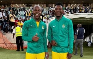 Knowledge Musona and Walter Musona in Zimbabwe national team colors
