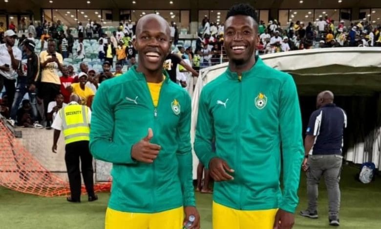 Knowledge Musona and Walter Musona in Zimbabwe national team colors