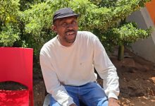 Letaro Chabangu sitting in a chair at the Hope of Achievers Rehabilitation Centre
