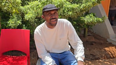 Letaro Chabangu sitting in a chair at the Hope of Achievers Rehabilitation Centre
