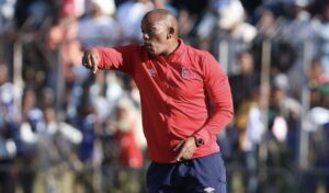 Orbit College coach Pogiso Makhoye giving instructions to his team