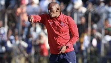 Orbit College coach Pogiso Makhoye giving instructions to his team