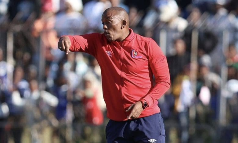 Orbit College coach Pogiso Makhoye giving instructions to his team