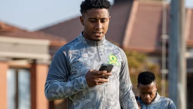 Brazilian forward Lucas Ribeiro Costa on his phone