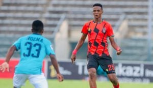 TS Galaxy defender in action against Richards Bay FC