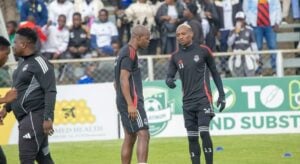 Knowledge Musona and Khama Billiat during warm-up