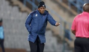Orbit College coach Pogiso Makhoye giving instructions to the players