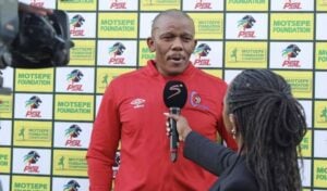 Orbit College head coach Pogiso Makhoye speaking with media
