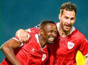 Vusimuzi Mncube and Bradley Grobler celebrating Sekhukhune United's goals