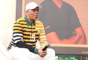 Doctor Khumalo wearing a Bafana Bafana jersey