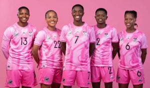 Banyana Banyana players wearing a pink kit by Le Coq Sportif