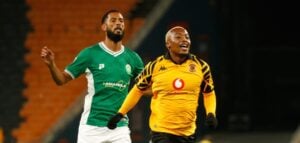 Khanyisa Mayo and Taariq Fielies in action during a League match at FNB Stadium
