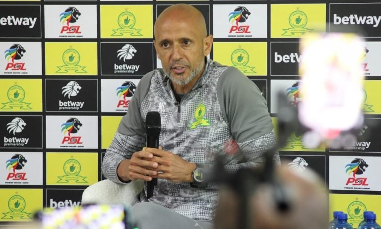 Miguel Cardoso addressing the media
