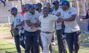 Ngezi Platinum Stars head coach Takesure Chiragwi being held back