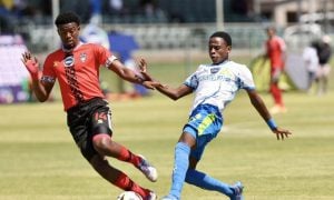 Mamelodi Sundowns and TS Galaxy DDC players challenge for the ball