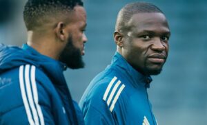 Tshegofatso Mabasa with Orlando Pirates in pitch inspection