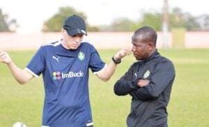 Zimbabwe coach Michael Nees discussing with his assistant Takesure Chiragwi