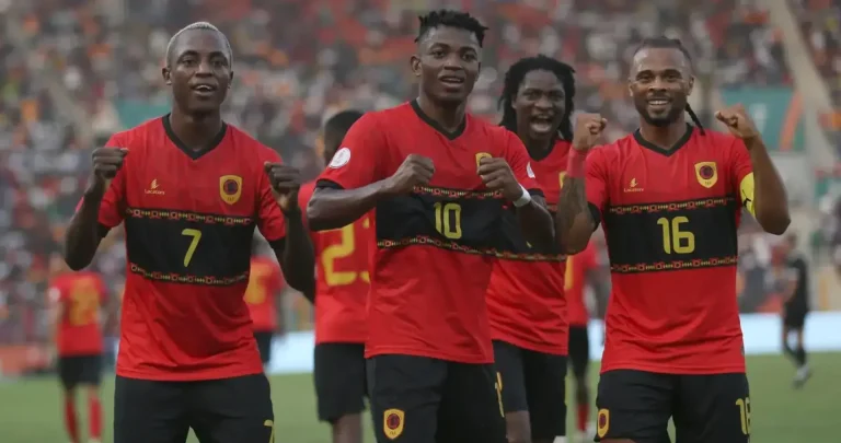 Gilberto and Angola players celebrating