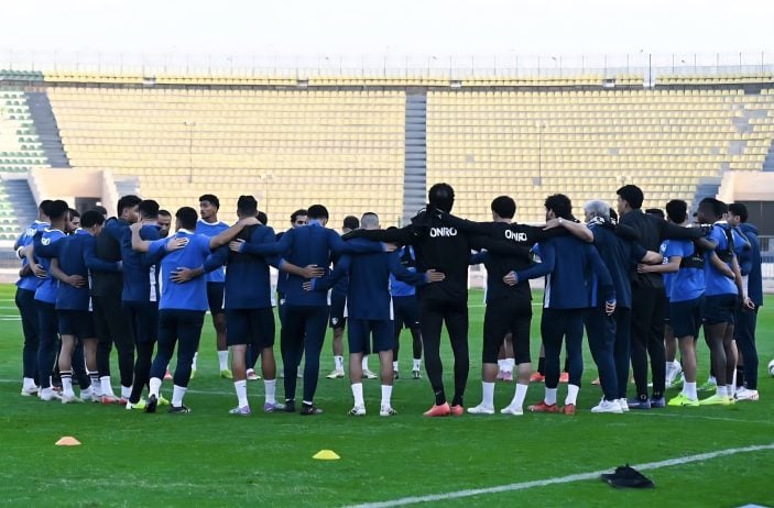 Zamalek SC players praying before a training session
