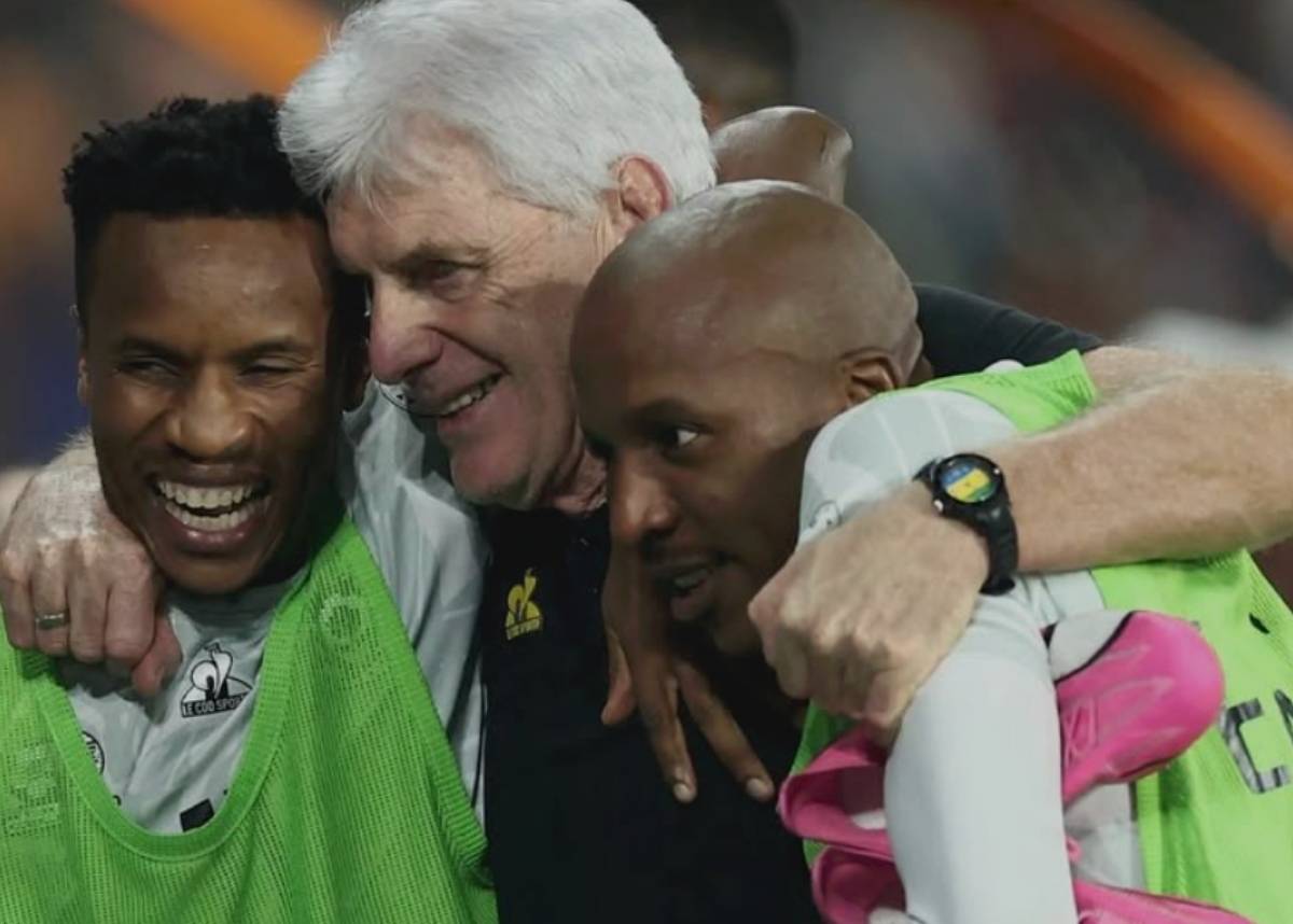 Bafana Bafana's Themba Zwane, coach Hugo Broos and Khuliso Mudau celebrate beating Morocco at Afcon 2024. Image: Bafana Bafana