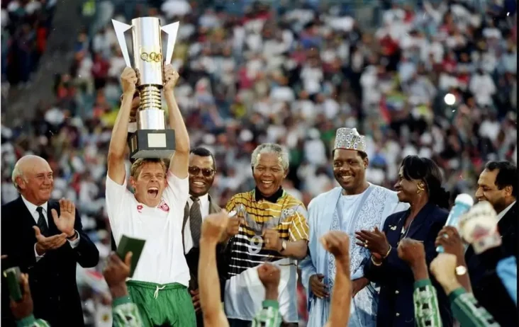 Bafana Bafana icon Neil Tovey lifting the 1996 AFCON trophy