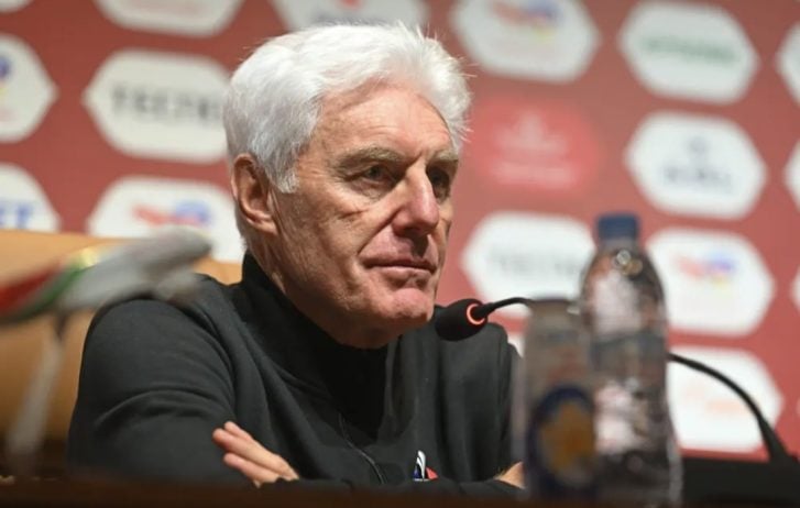 Hugo Broos addressing the media ahead of the match against Angola