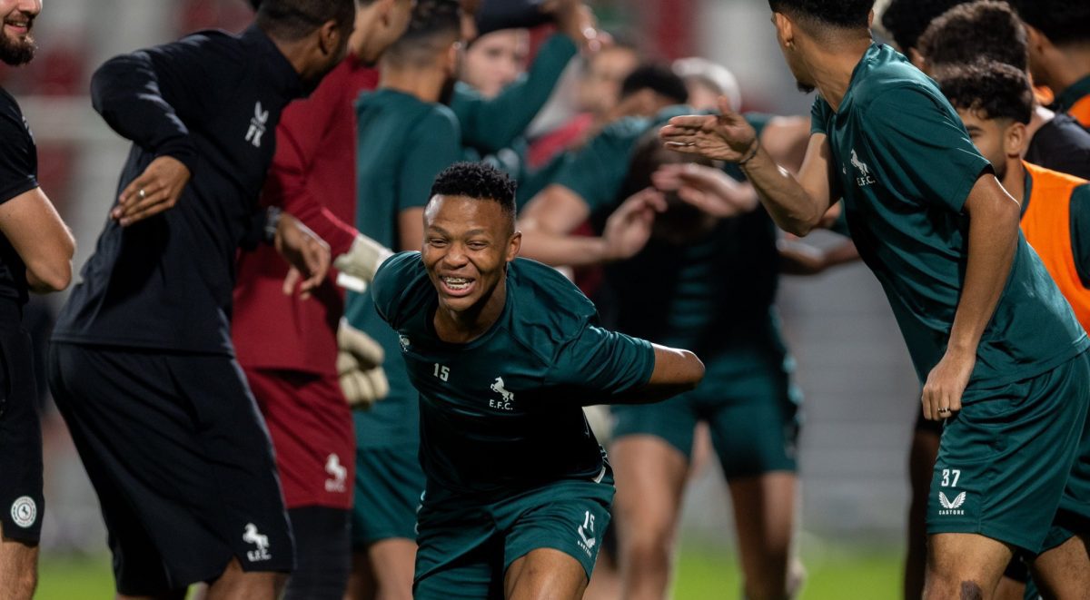 Mohau Nkota with his teammates at Al-Ettifaq after a match