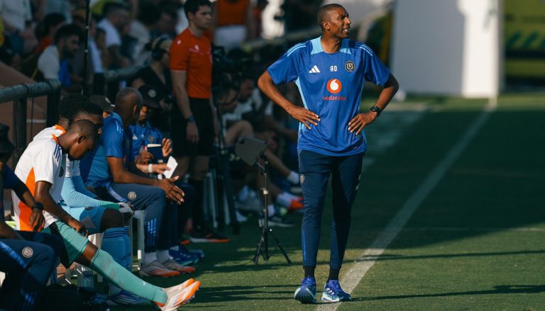 Abdeslam Ouaddou with the Orlando Pirates bench