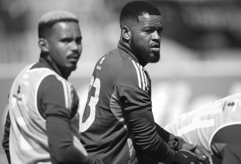 Sipho Mbule with Oswin Appollis of Orlando Pirates