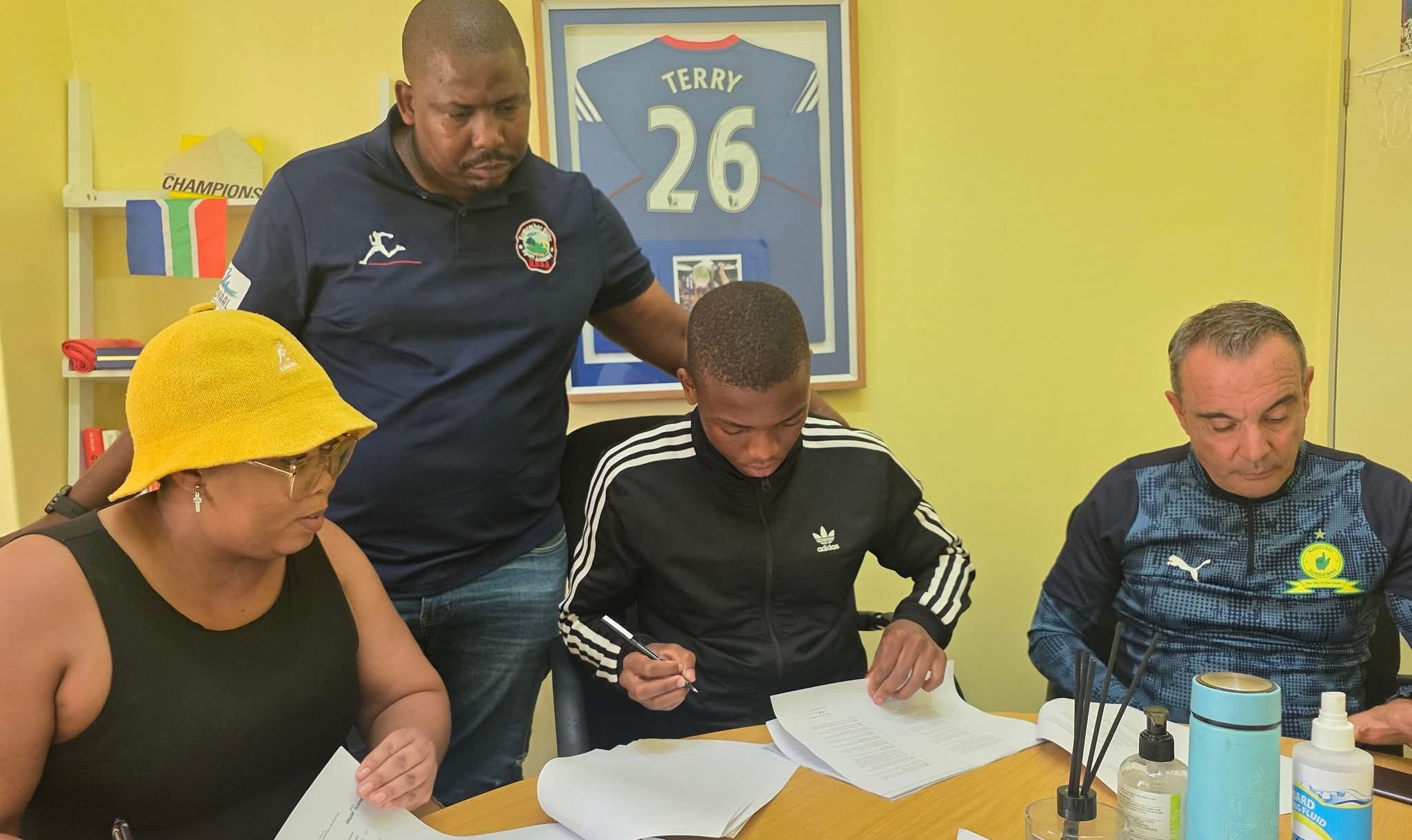 Siyabonga Mbongo signing with Mamelodi Sundowns