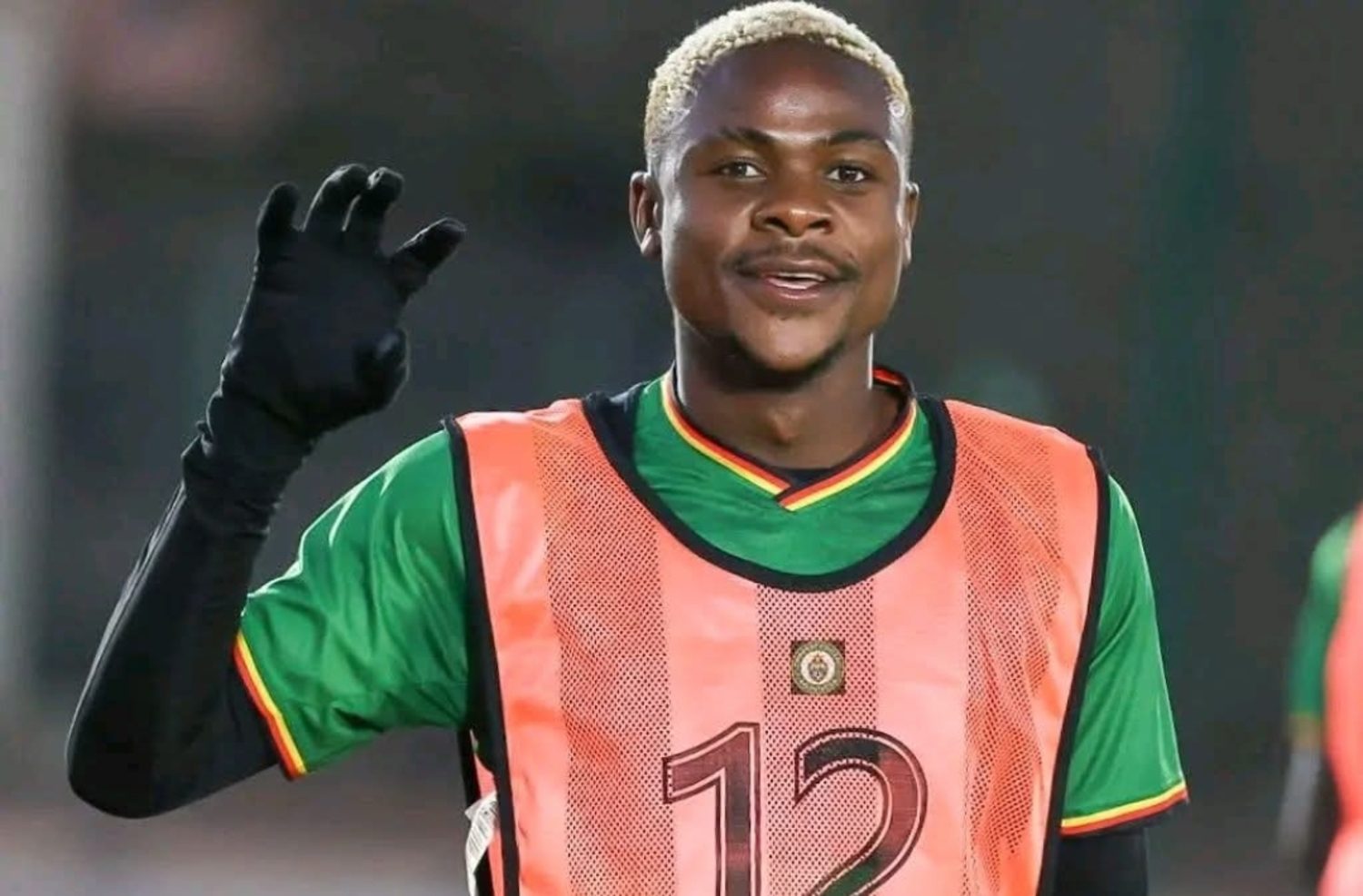 Daniel Msendami in Zimbabwe national team colors
